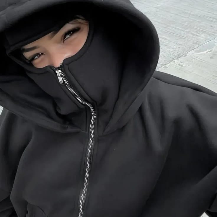 Balaclava hood of the hoodie zipped up to the nose
